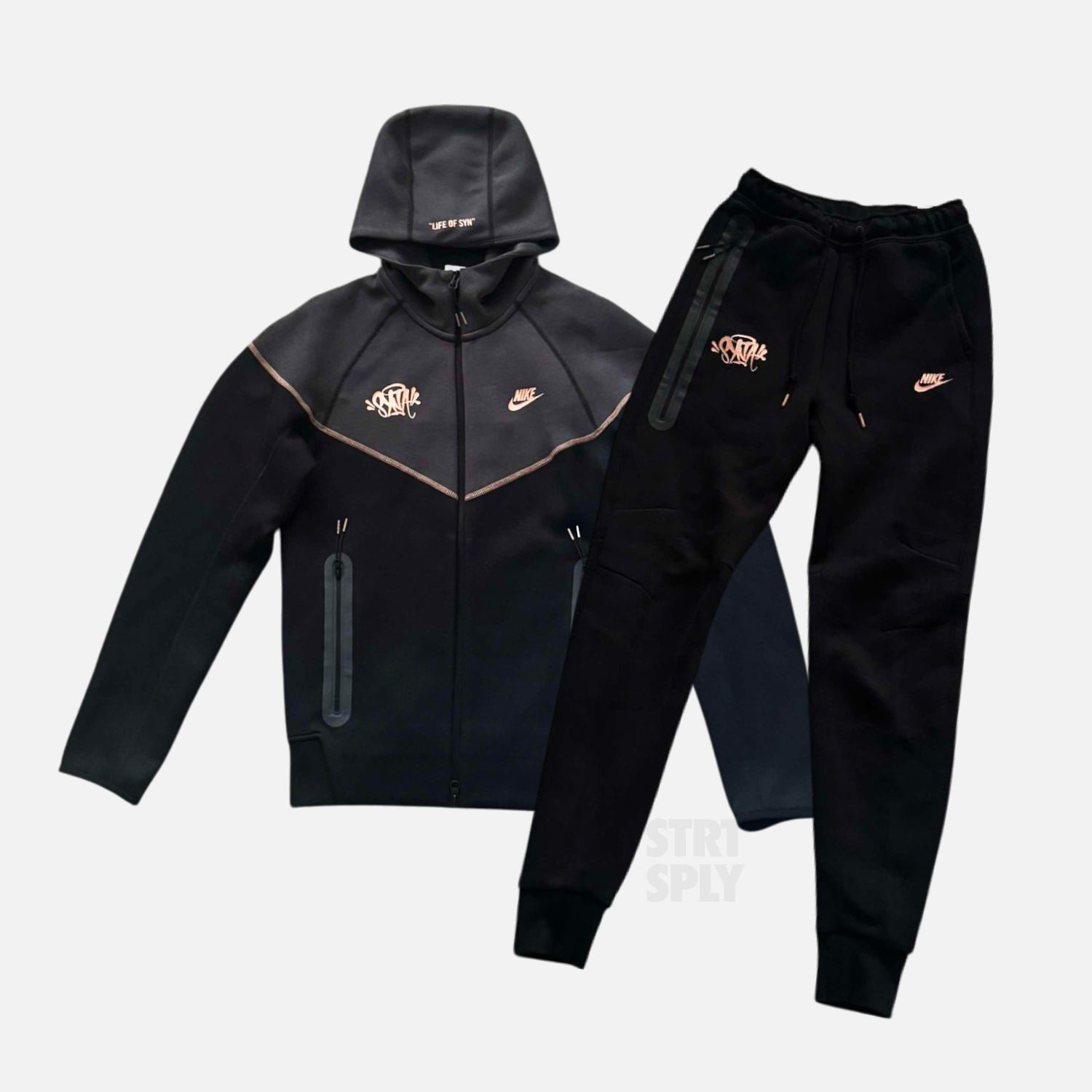 NIKESYNAWORLDTECHFLEECEBLACKBRONZESTRTSPLYCENTRALCEE-1.jpg Nike x Syna World Tech Fleece Tracksuit - Black / Bronze - Image 1