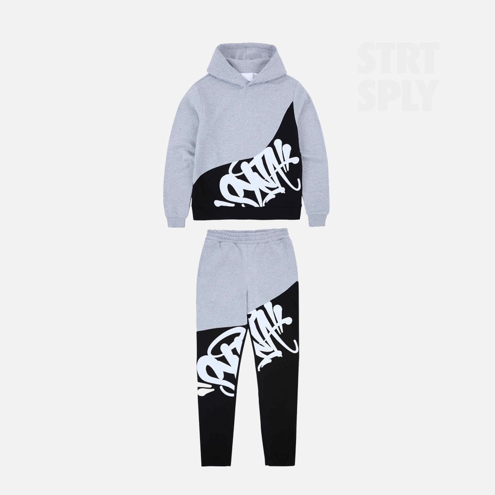 SYNAWORLDSLICETRACKSUITGREYBLACKSTRTSPLYCENTRALCEE-1.jpg Syna World Logo Slice Tracksuit - Grey / Black - Image 1